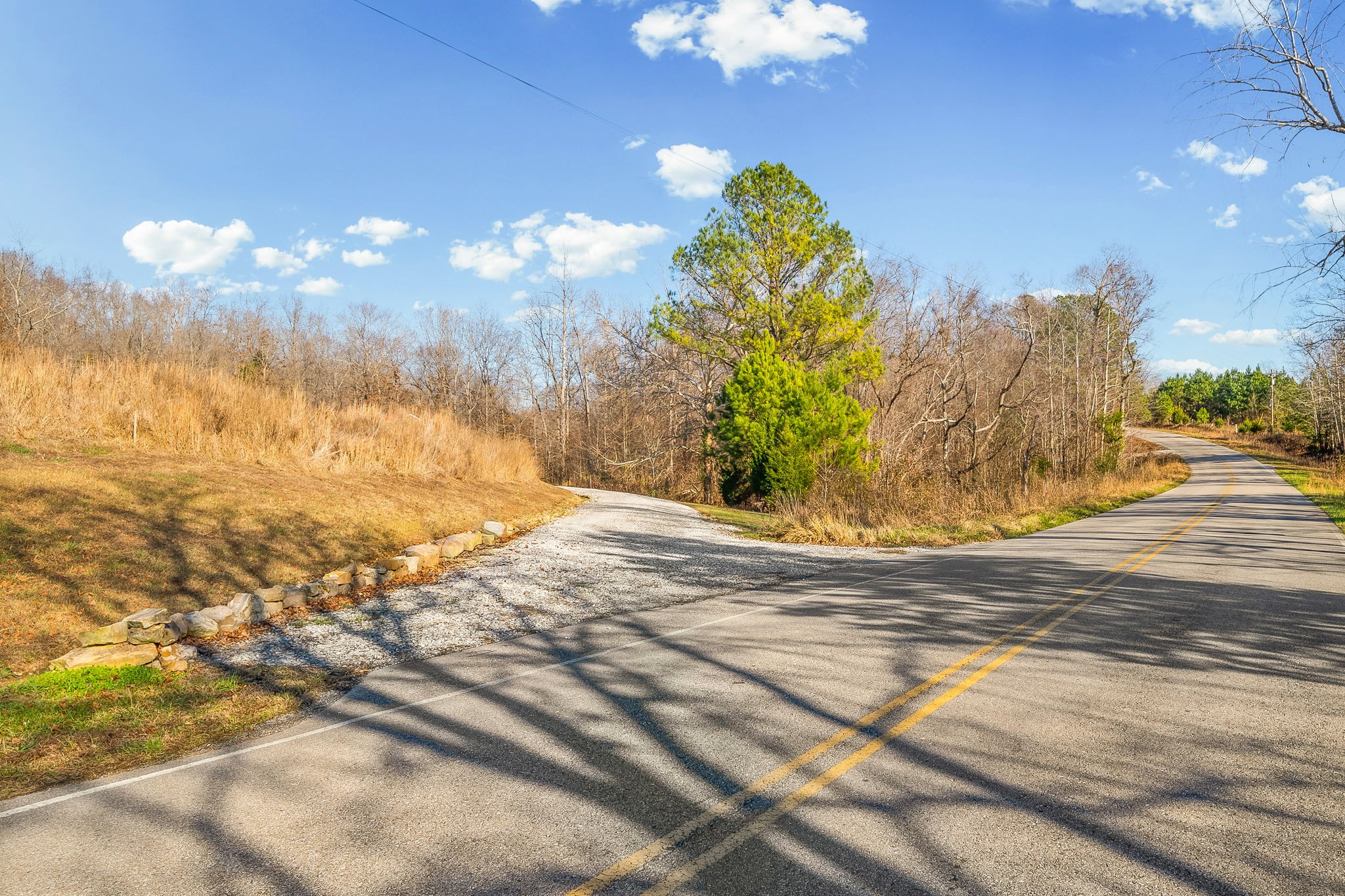 959 Herman Adams Road Cumberland City, TN 37050 - Photo 36 of 62 a view of a fountain in the middle of a yard