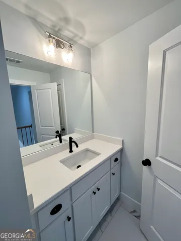 a view of swimming pool next to a yard