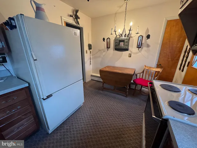 a room with furniture and wooden floor