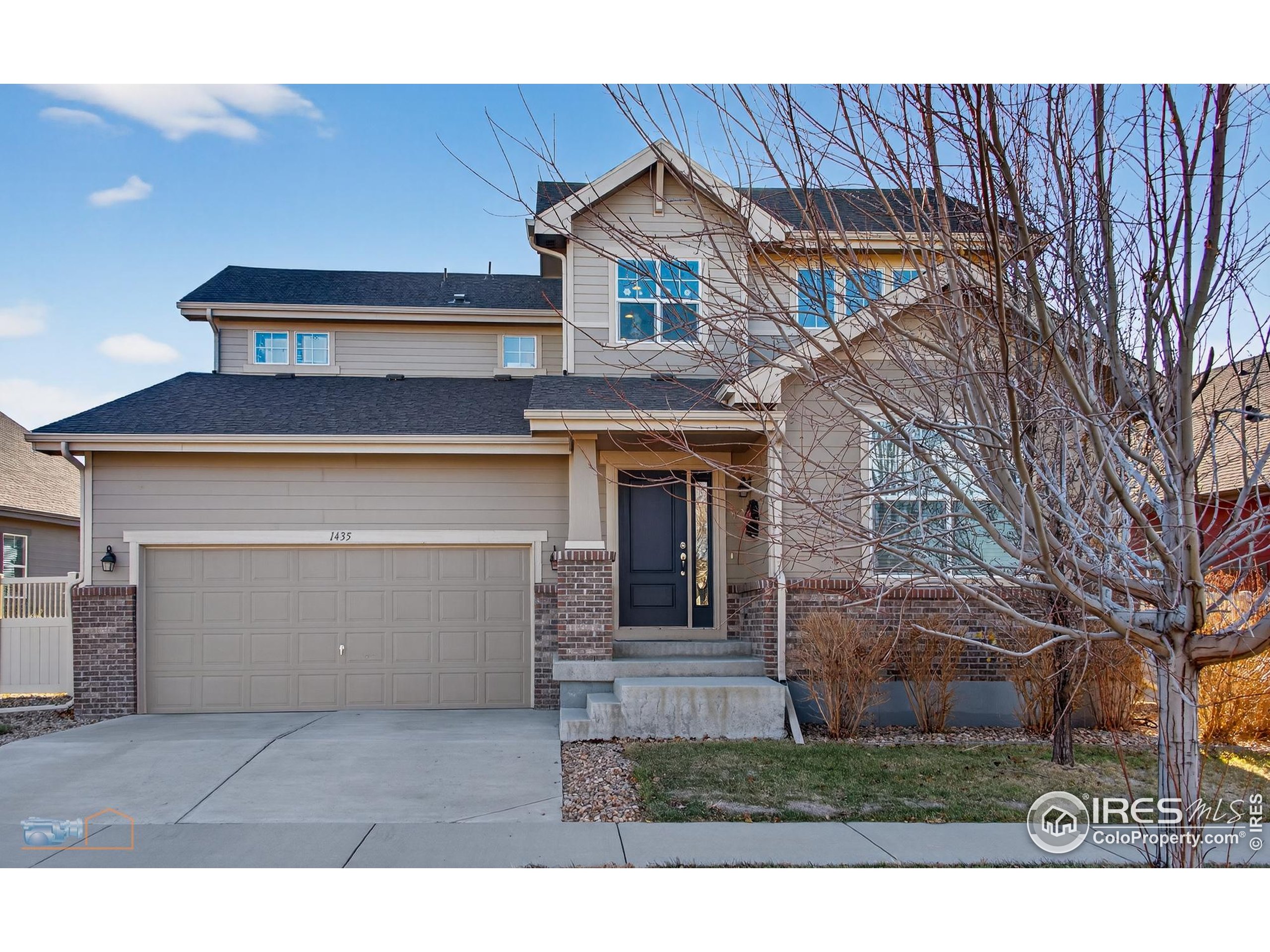 1435 Rustic Drive Longmont, CO 80504 - Photo 2 of 45 a house view with a outdoor space