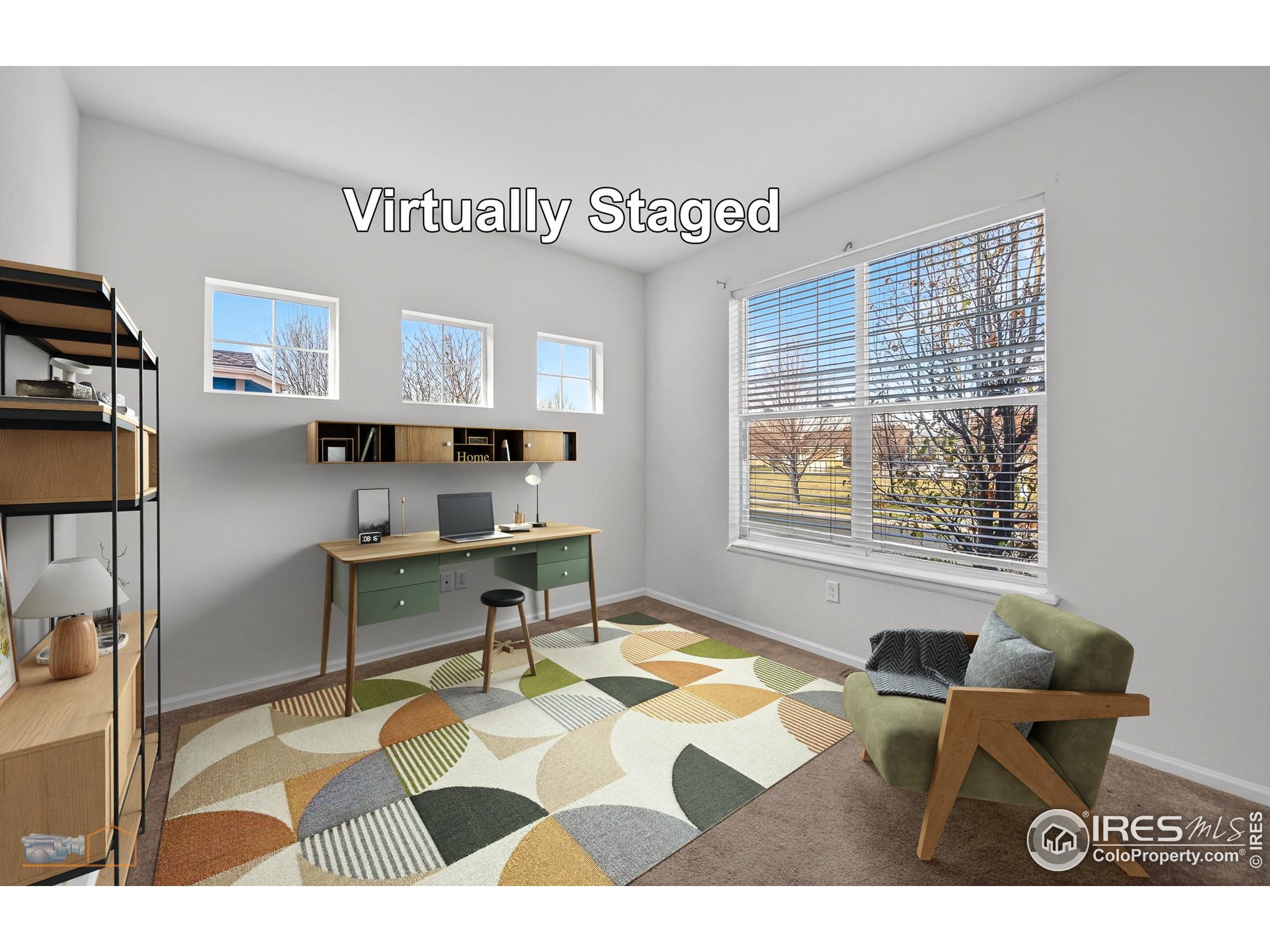 1435 Rustic Drive Longmont, CO 80504 - Photo 21 of 45 a living room with furniture and a window