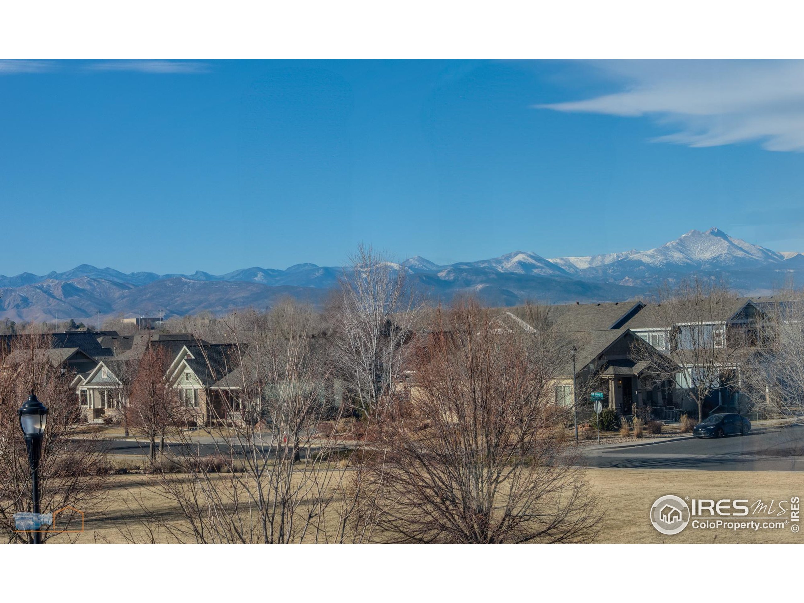 1435 Rustic Drive Longmont, CO 80504 - Photo 24 of 45 a view of a city with mountain