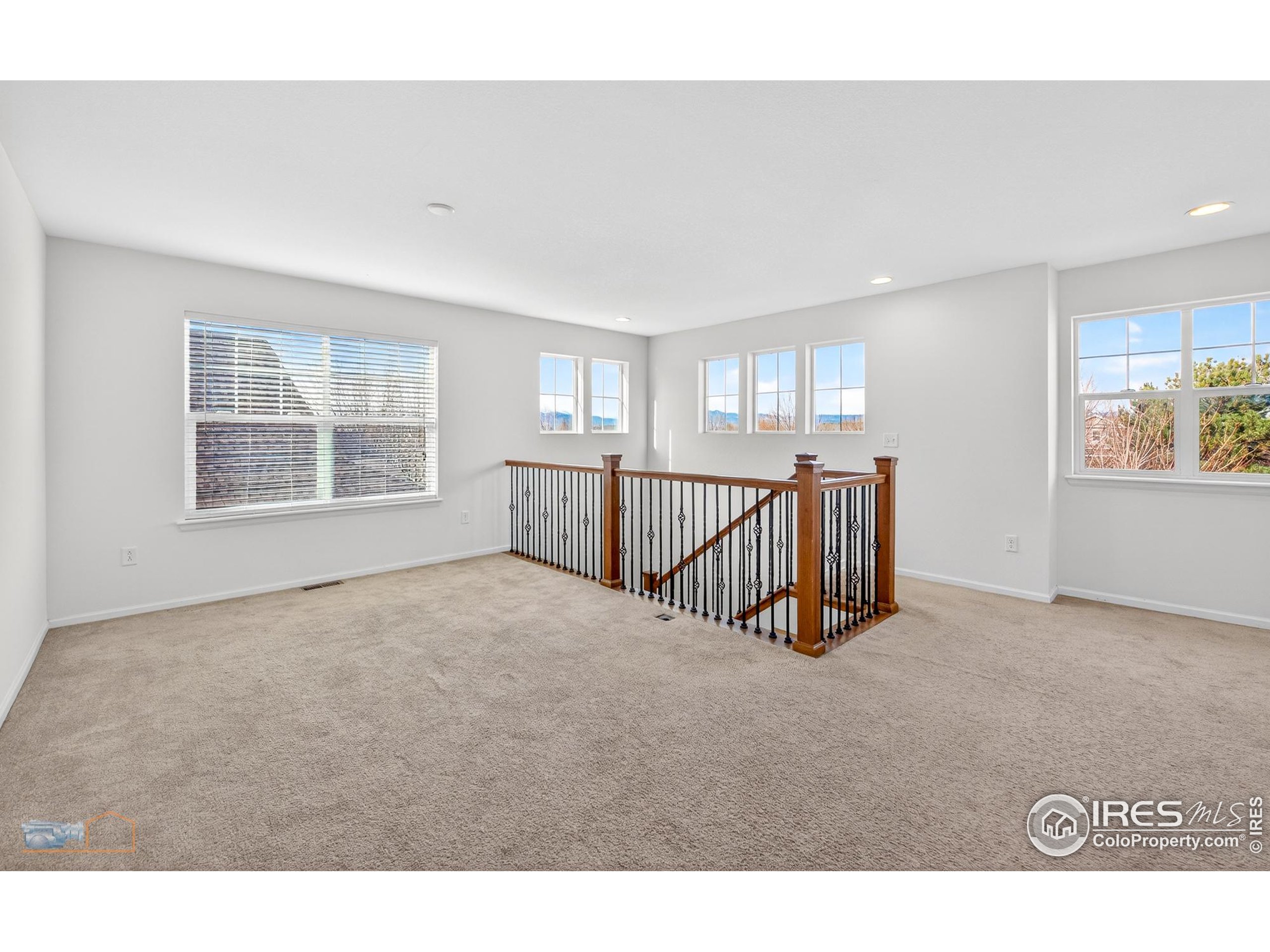 1435 Rustic Drive Longmont, CO 80504 - Photo 26 of 45 a view of a kitchen with furniture and windows