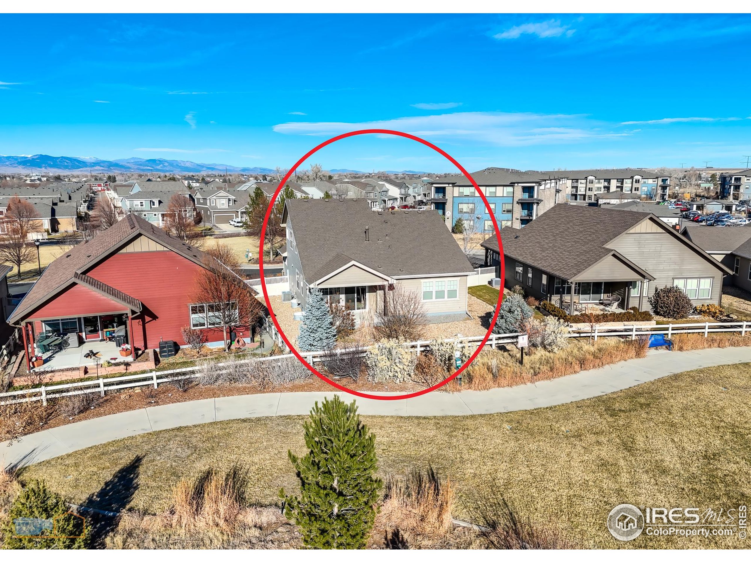 1435 Rustic Drive Longmont, CO 80504 - Photo 42 of 45 an aerial view of a house with swimming pool