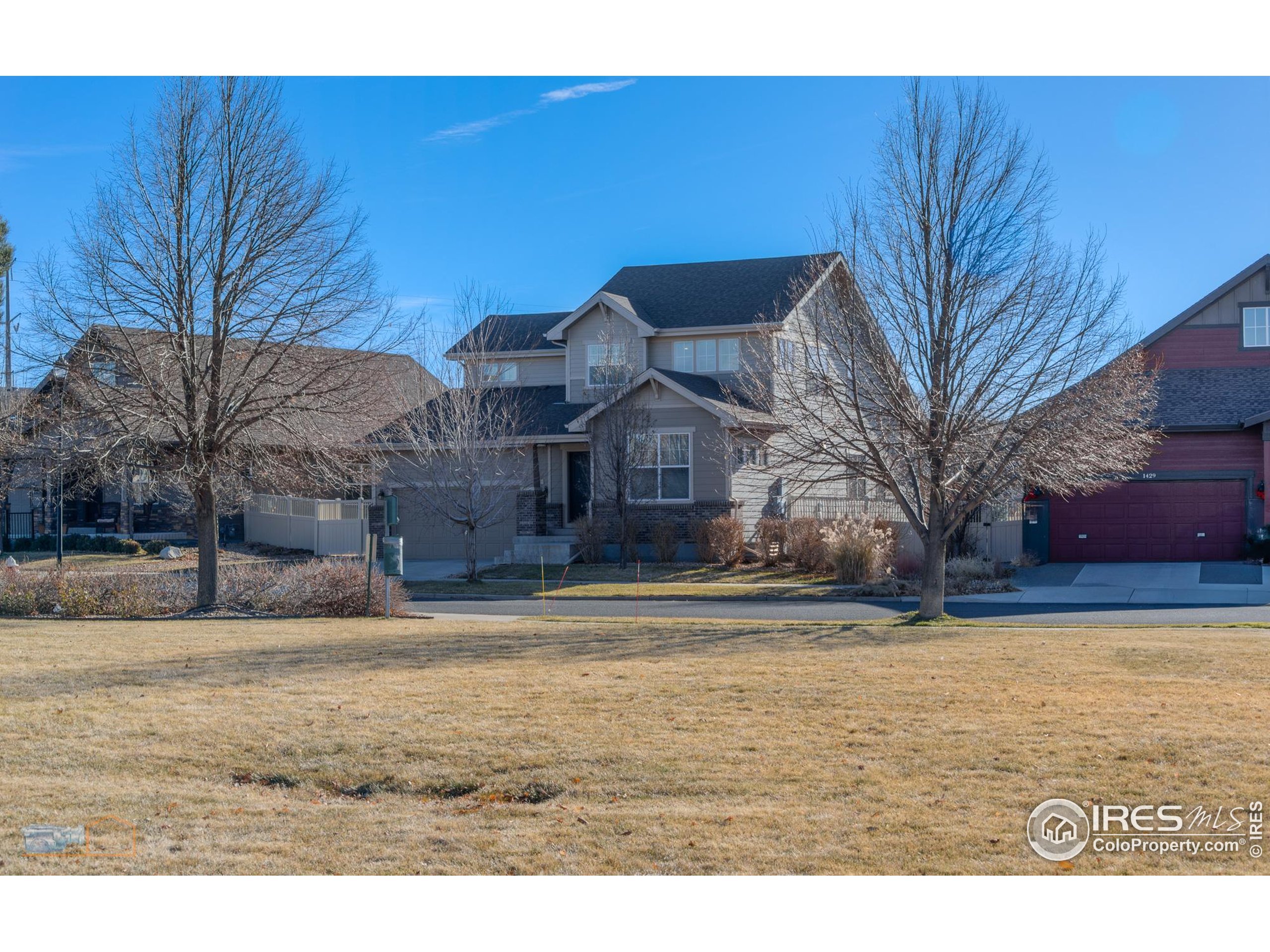 1435 Rustic Drive Longmont, CO 80504 - Photo 43 of 45 a view of a house with a yard