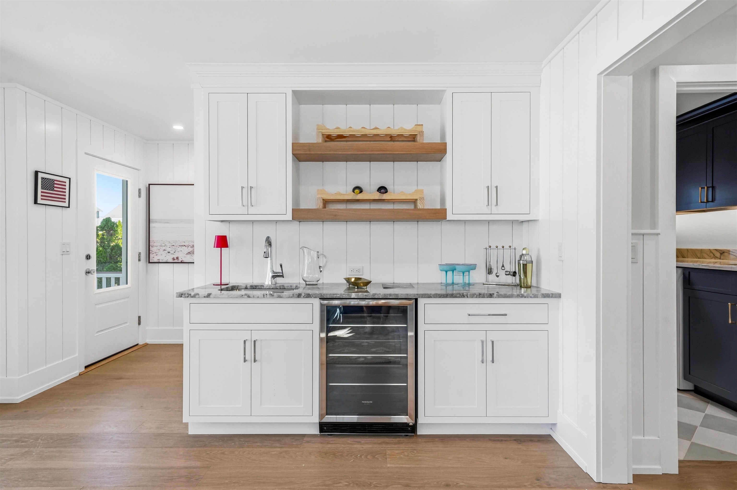 46 West 31st Avalon, NJ 08202 - Photo 15 of 50 a kitchen with stainless steel appliances granite countertop a stove and white cabinets