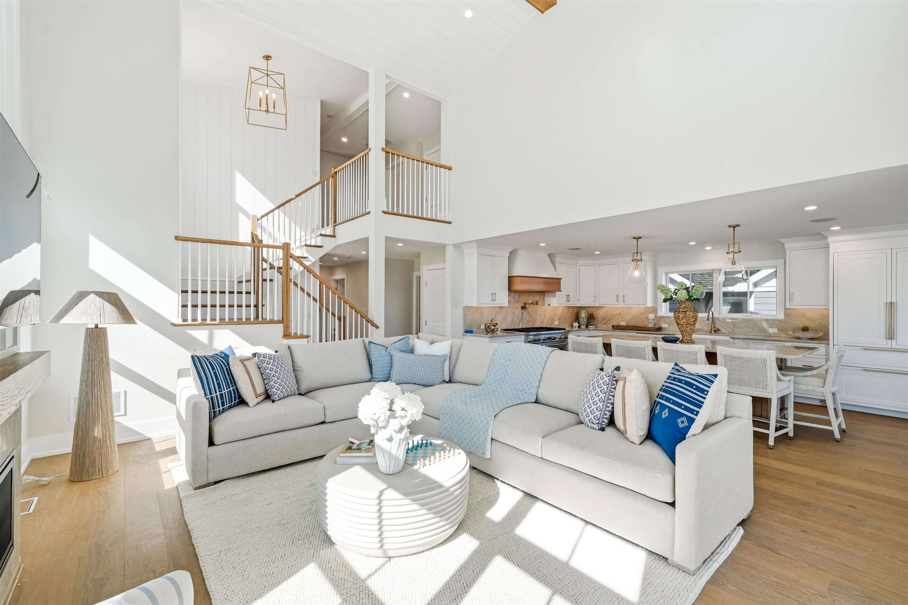 46 West 31st Avalon, NJ 08202 - Photo 21 of 50 a living room with furniture or kitchen view and a wooden floor