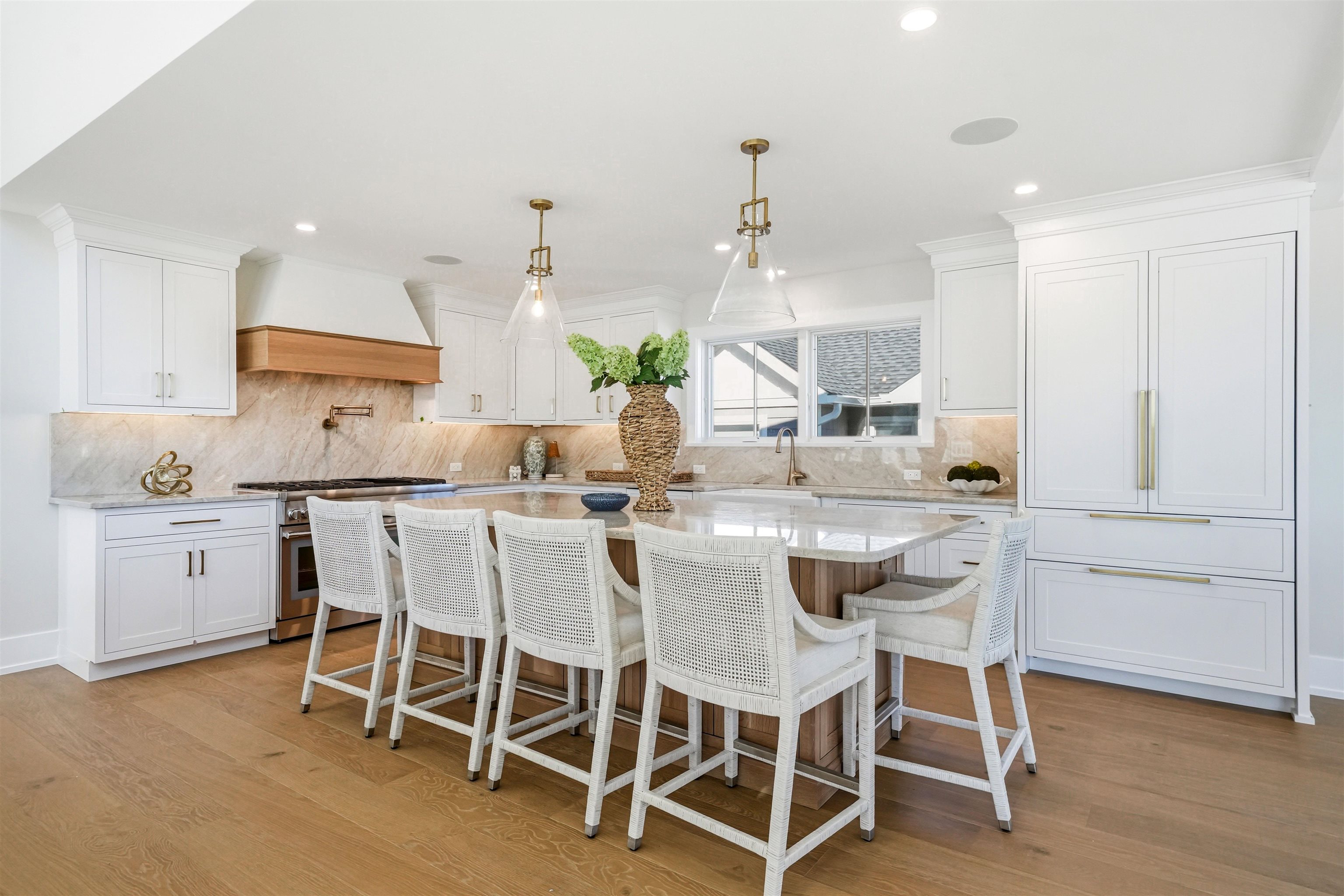 46 West 31st Avalon, NJ 08202 - Photo 25 of 50 a kitchen with kitchen island cabinets and chairs