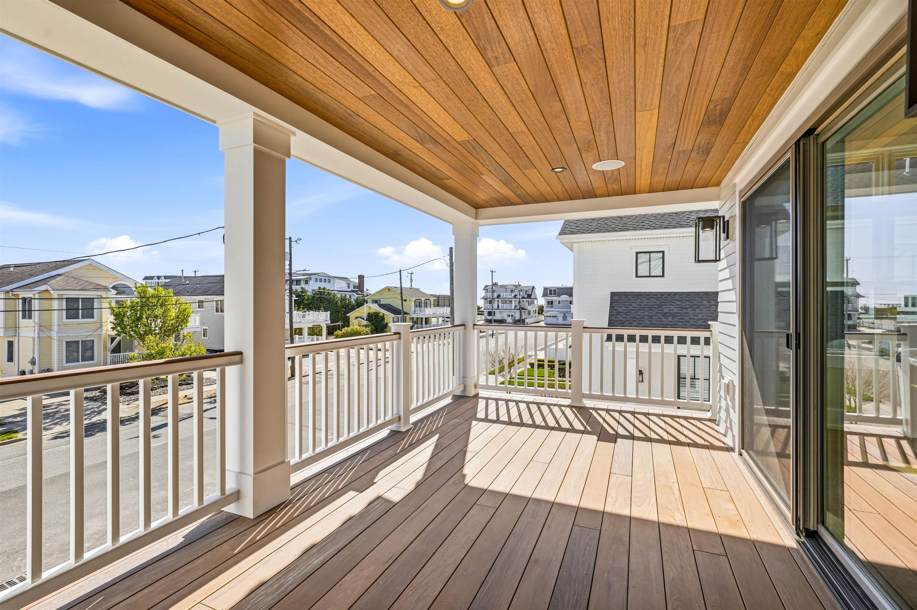 46 West 31st Avalon, NJ 08202 - Photo 30 of 50 a view of a balcony with wooden floor