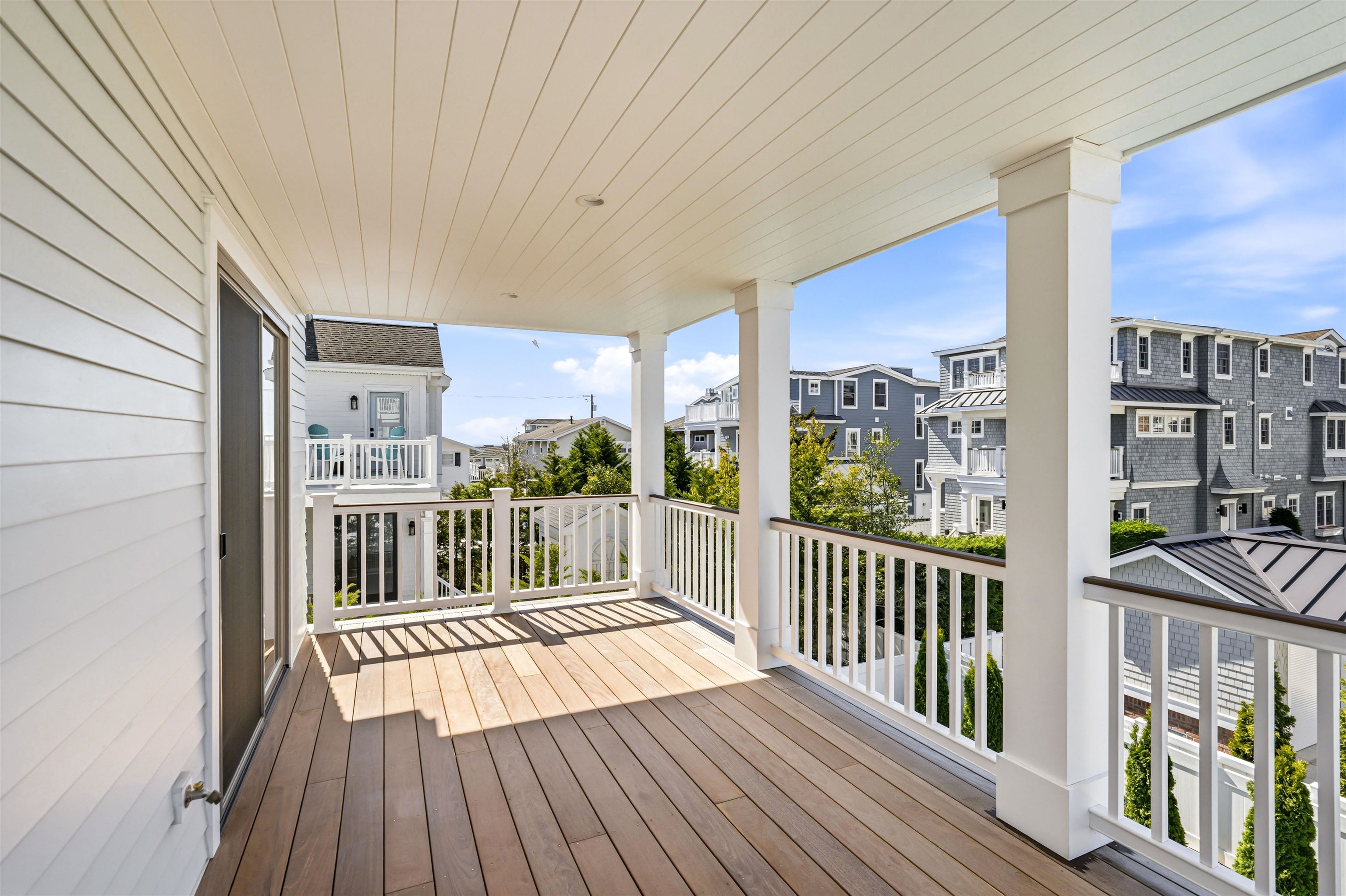 46 West 31st Avalon, NJ 08202 - Photo 35 of 50 a view of a balcony with wooden floor