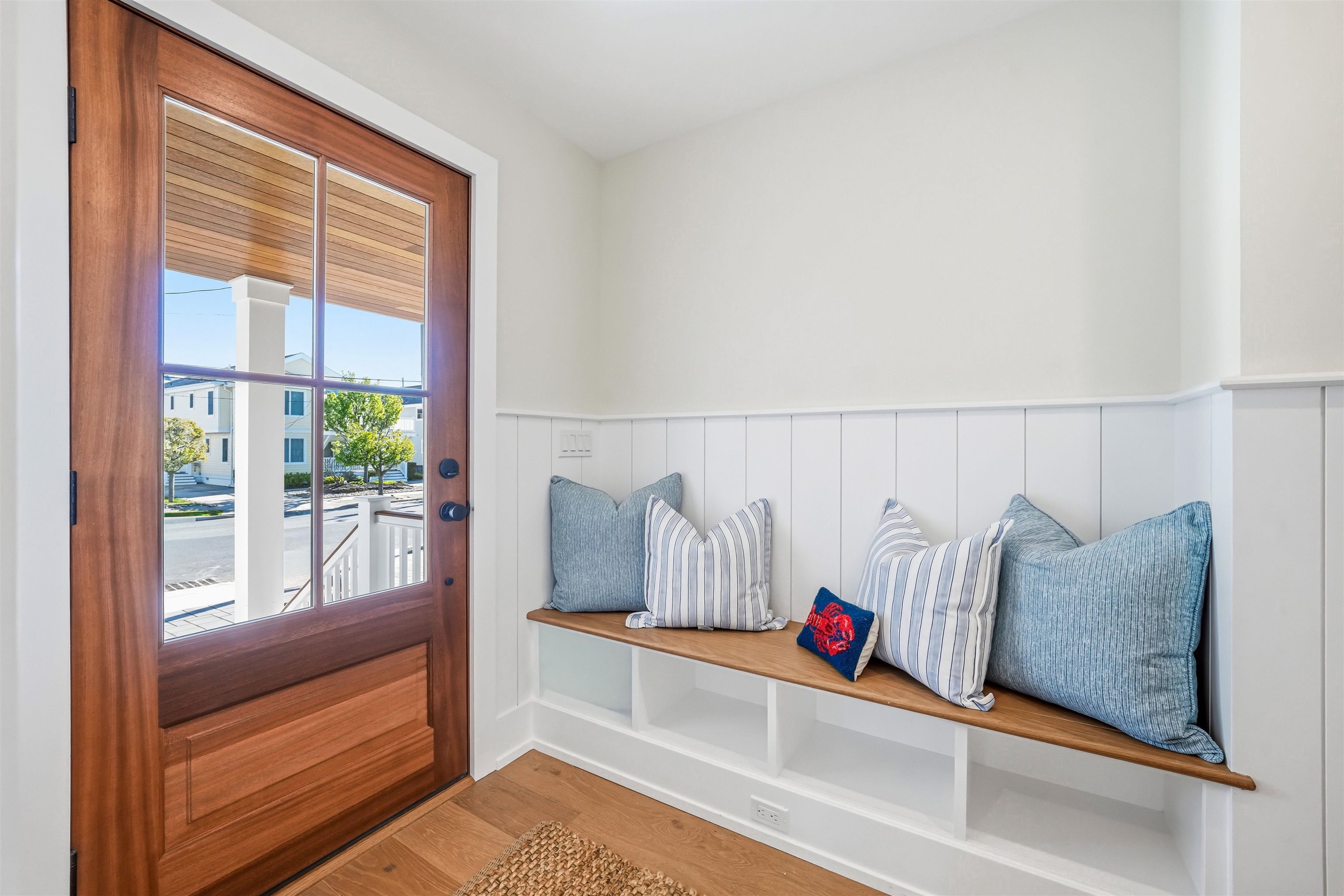 46 West 31st Avalon, NJ 08202 - Photo 4 of 50 a living room with furniture and a floor to ceiling window
