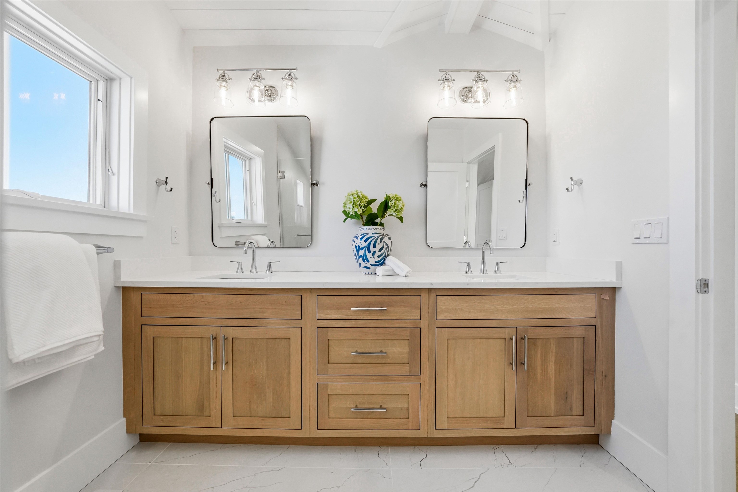 46 West 31st Avalon, NJ 08202 - Photo 46 of 50 a bathroom with a double vanity sink mirror and