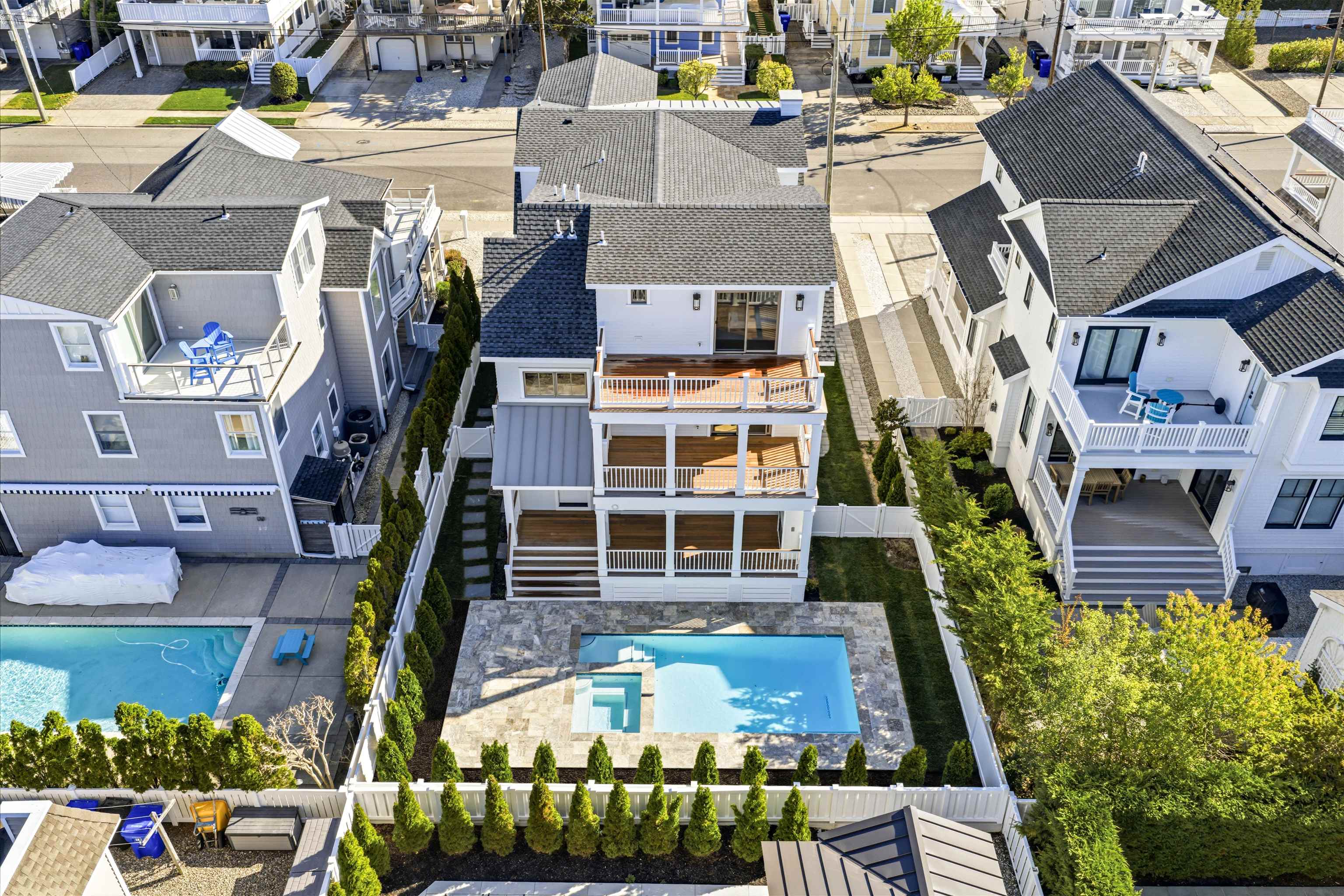 46 West 31st Avalon, NJ 08202 - Photo 48 of 50 a front view of a house with a garden