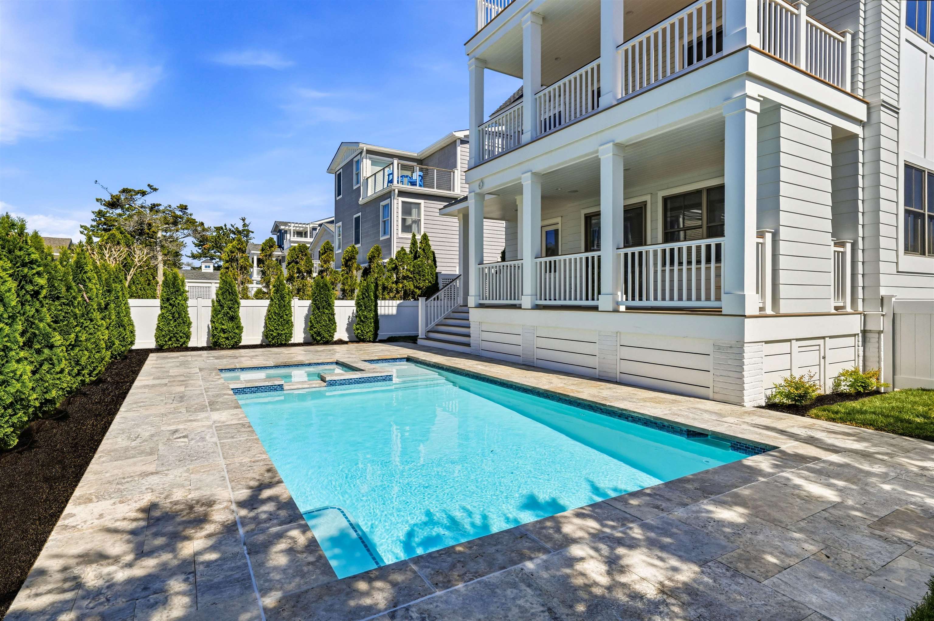 46 West 31st Avalon, NJ 08202 - Photo 49 of 50 a view of a house with swimming pool