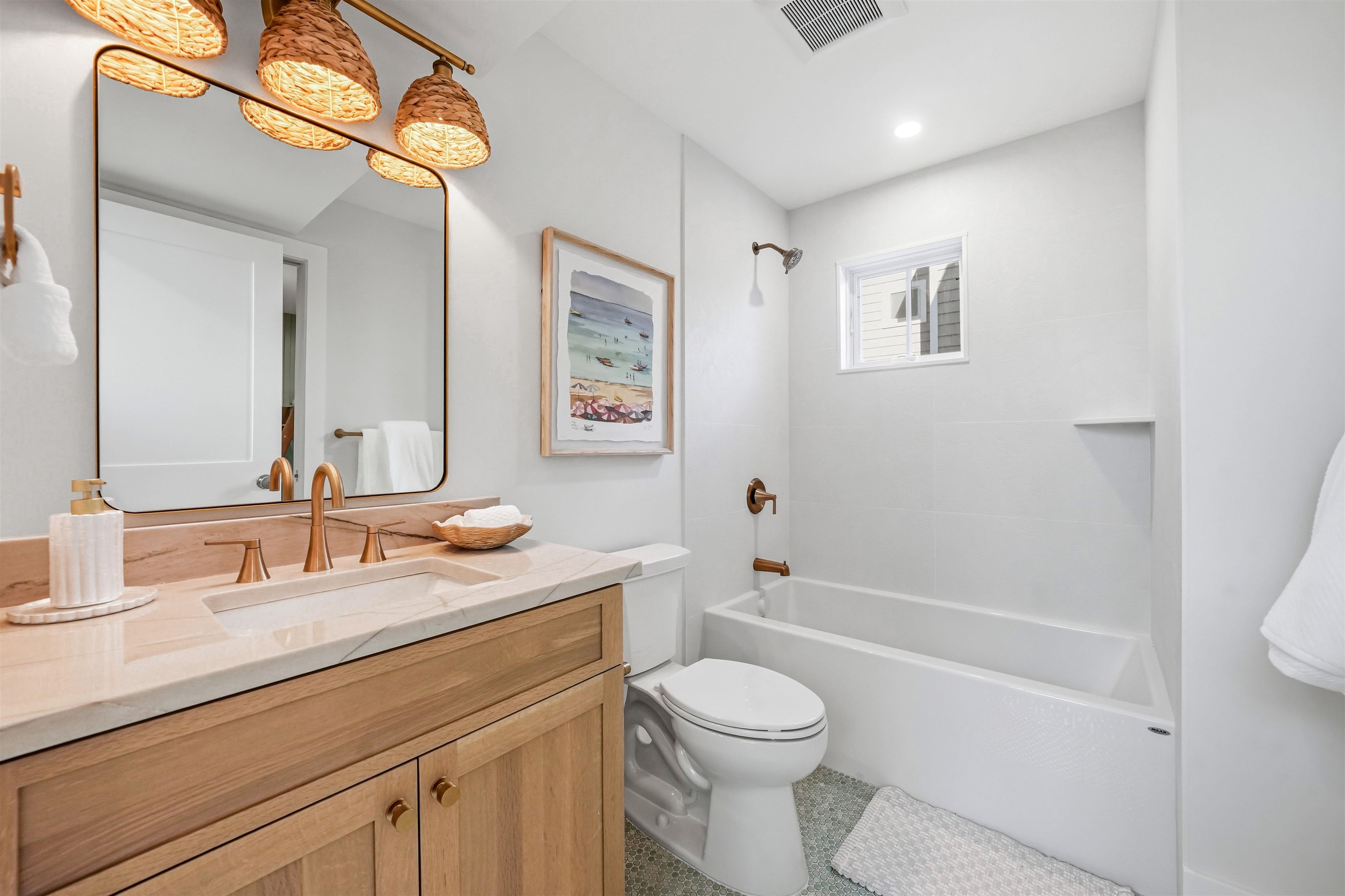 46 West 31st Avalon, NJ 08202 - Photo 10 of 50 a bathroom with a granite countertop sink mirror vanity and toilet