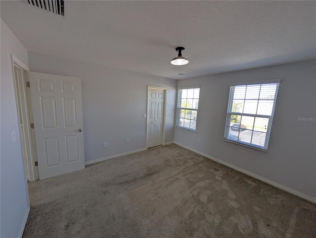 8955 Walnut Gable Court Riverview, FL 33578 - Photo 8 of 15 a view of an empty room with a window