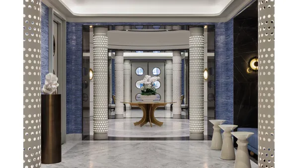 a bedroom with a bed and a mirror