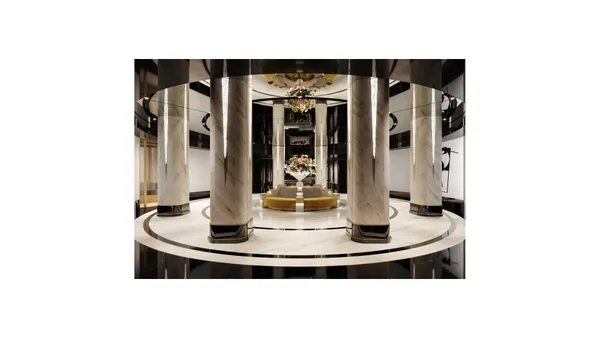 a living room with couches and painted walls with a large mirror