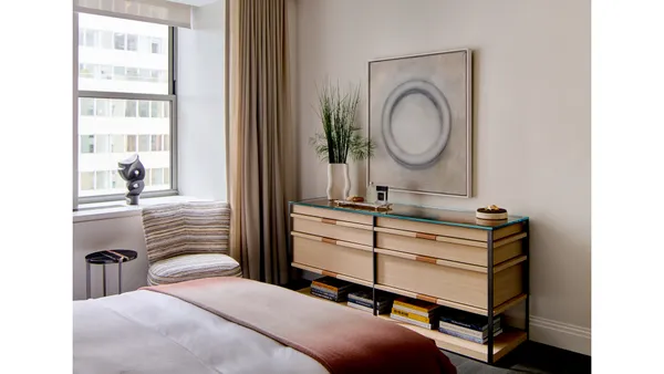 a room with a table and chairs