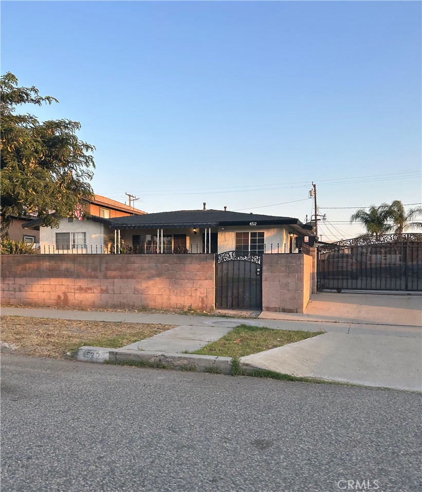 452 East H Street Colton, CA 92324 - Photo 1 of 1 a view of swimming pool yard