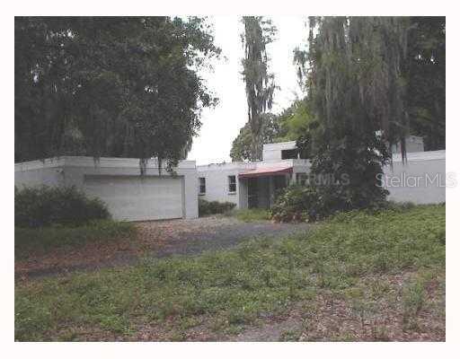 2504 Alvarez Road Tampa, FL 33618 - Photo 1 of 1 a view of a house with a yard