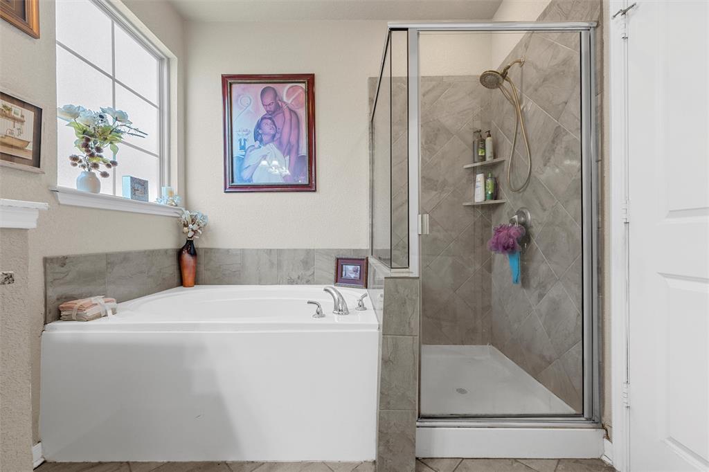 10620 Langham Drive Waco, TX 76708 - Photo 12 of 30 a bathroom with a shower and a sink