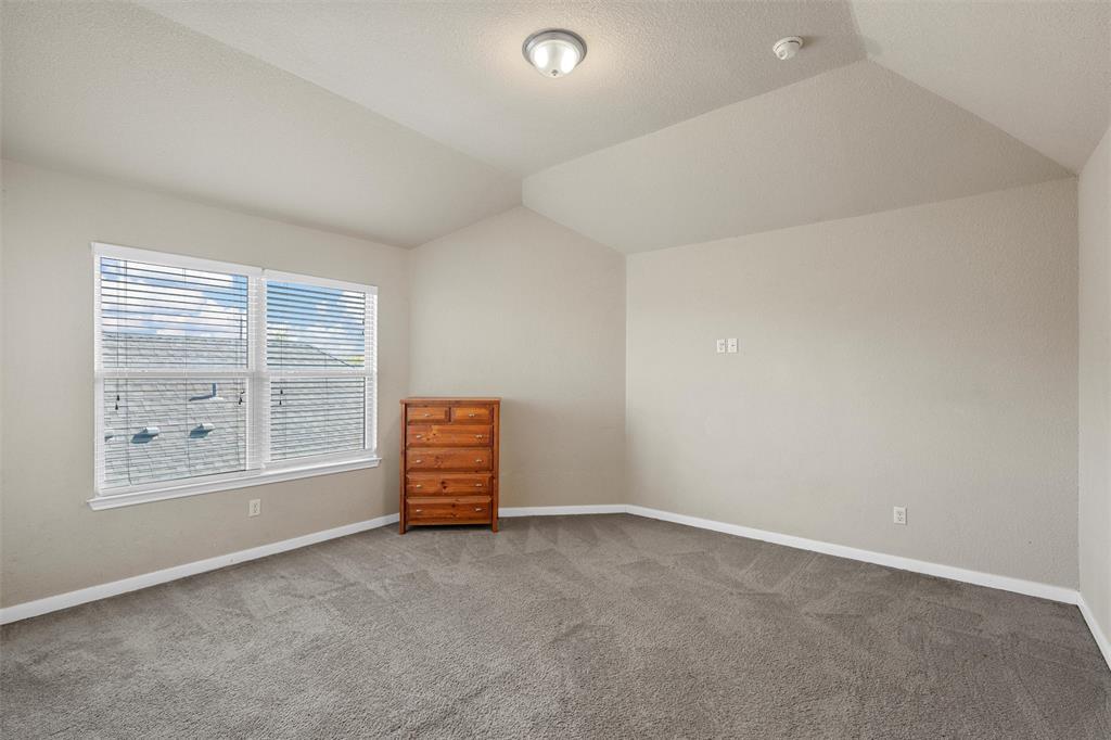 10620 Langham Drive Waco, TX 76708 - Photo 21 of 30 an empty room with windows