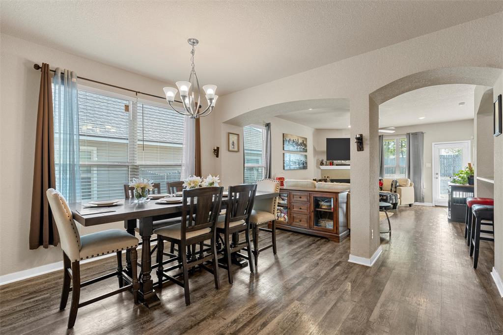 10620 Langham Drive Waco, TX 76708 - Photo 4 of 30 a view of a dining room with furniture window and wooden floor