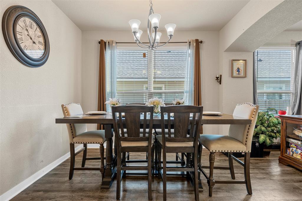 10620 Langham Drive Waco, TX 76708 - Photo 5 of 30 a view of a dining room with furniture window and wooden floor