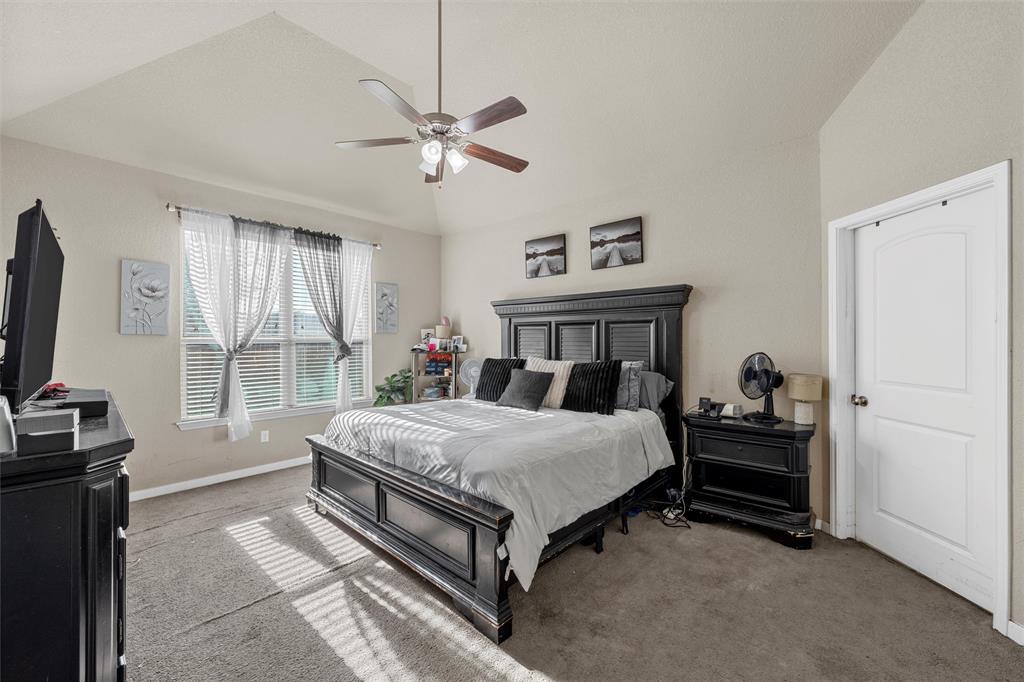 10620 Langham Drive Waco, TX 76708 - Photo 10 of 30 a bedroom with a bed and a window