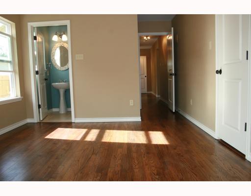 633 Chamberlain Street Corpus Christi, TX 78404 - Photo 5 of 9 a view of an empty room with wooden floor