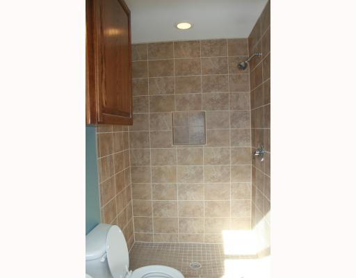 633 Chamberlain Street Corpus Christi, TX 78404 - Photo 6 of 9 a bathroom with a shower