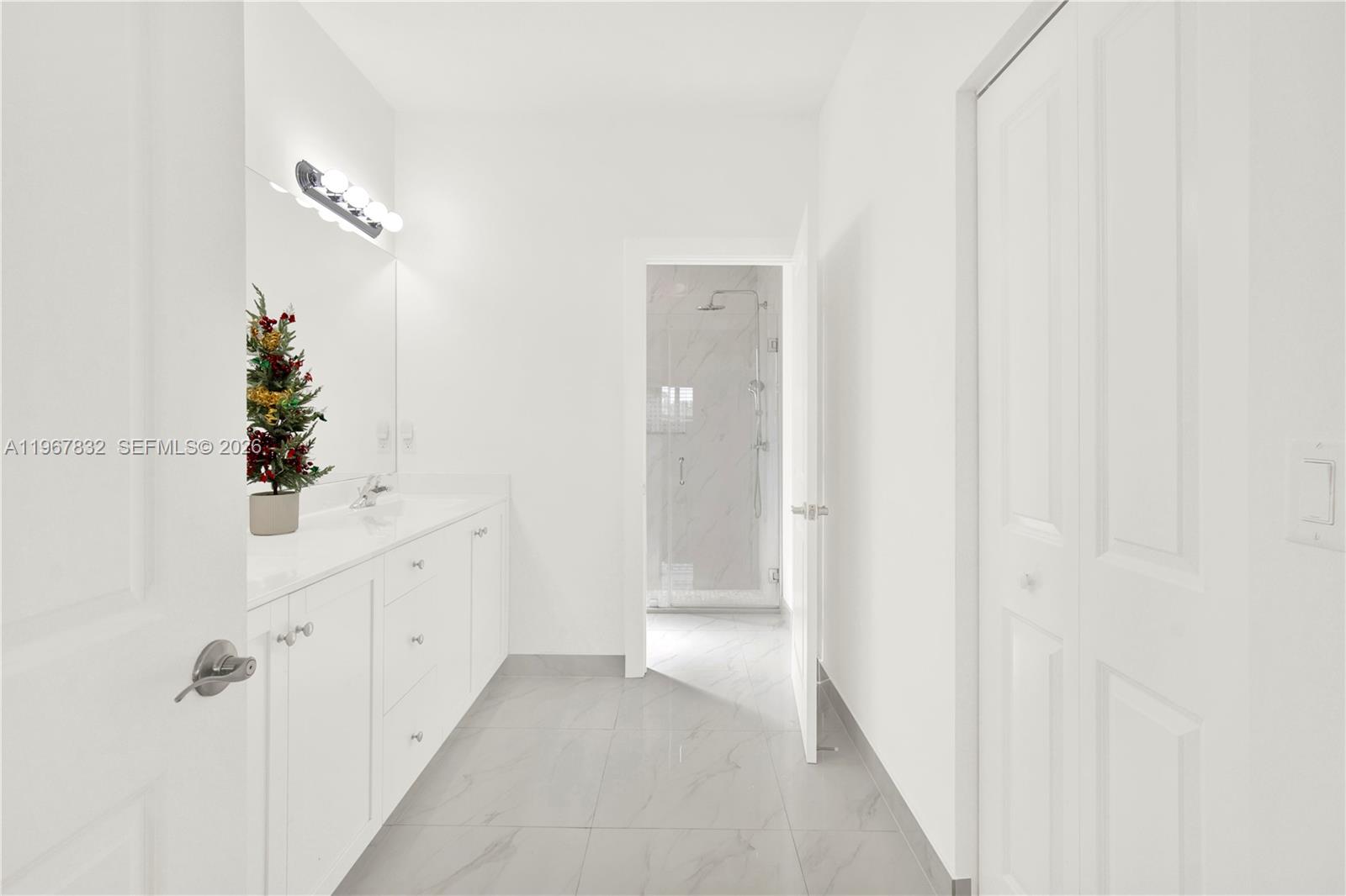 19059 Southwest 134th Court Miami, FL 33177 - Photo 25 of 52 a view of a hallway