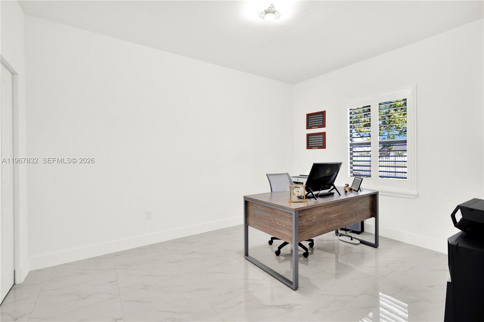 19059 Southwest 134th Court Miami, FL 33177 - Photo 35 of 52 a view of a workspace with a window