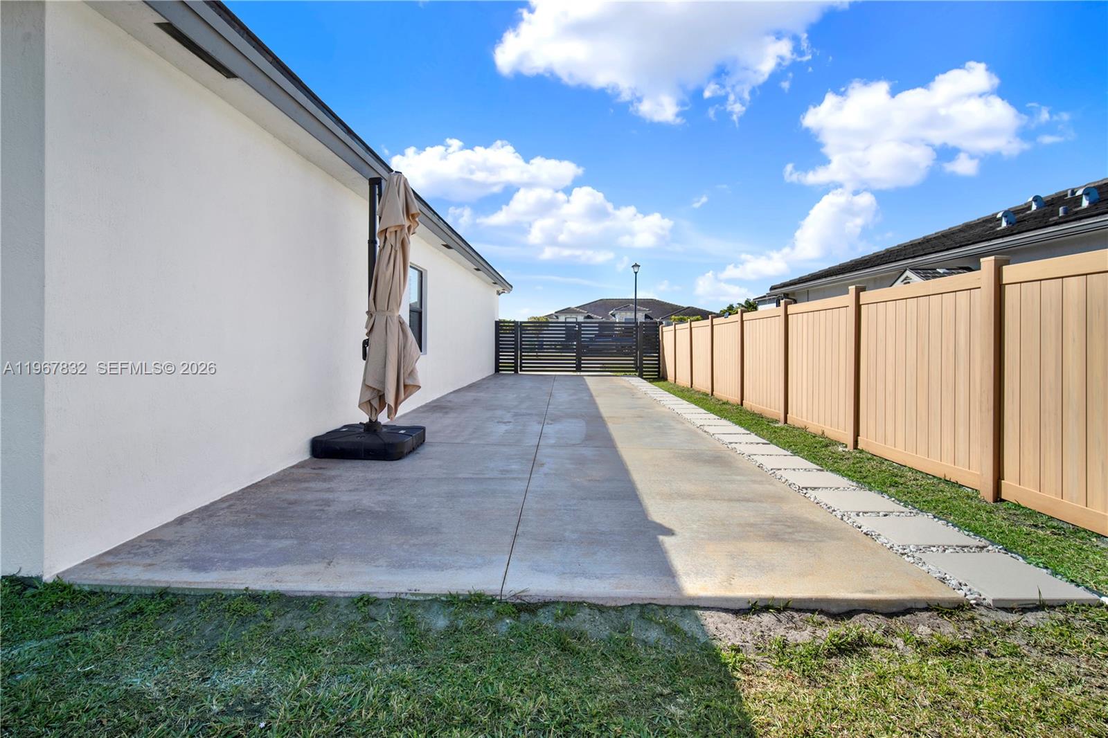 19059 Southwest 134th Court Miami, FL 33177 - Photo 40 of 52 a view of entryway with yard
