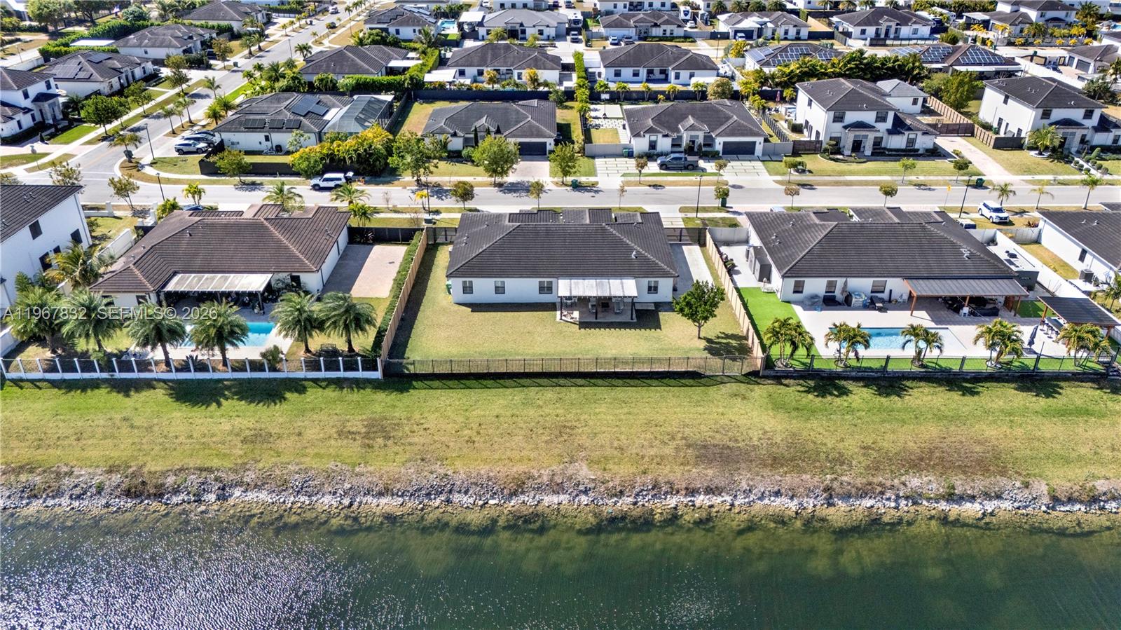 19059 Southwest 134th Court Miami, FL 33177 - Photo 50 of 52 an aerial view of residential houses with outdoor space and swimming pool