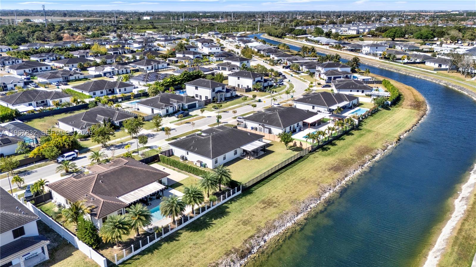19059 Southwest 134th Court Miami, FL 33177 - Photo 51 of 52 an aerial view of residential houses with outdoor space