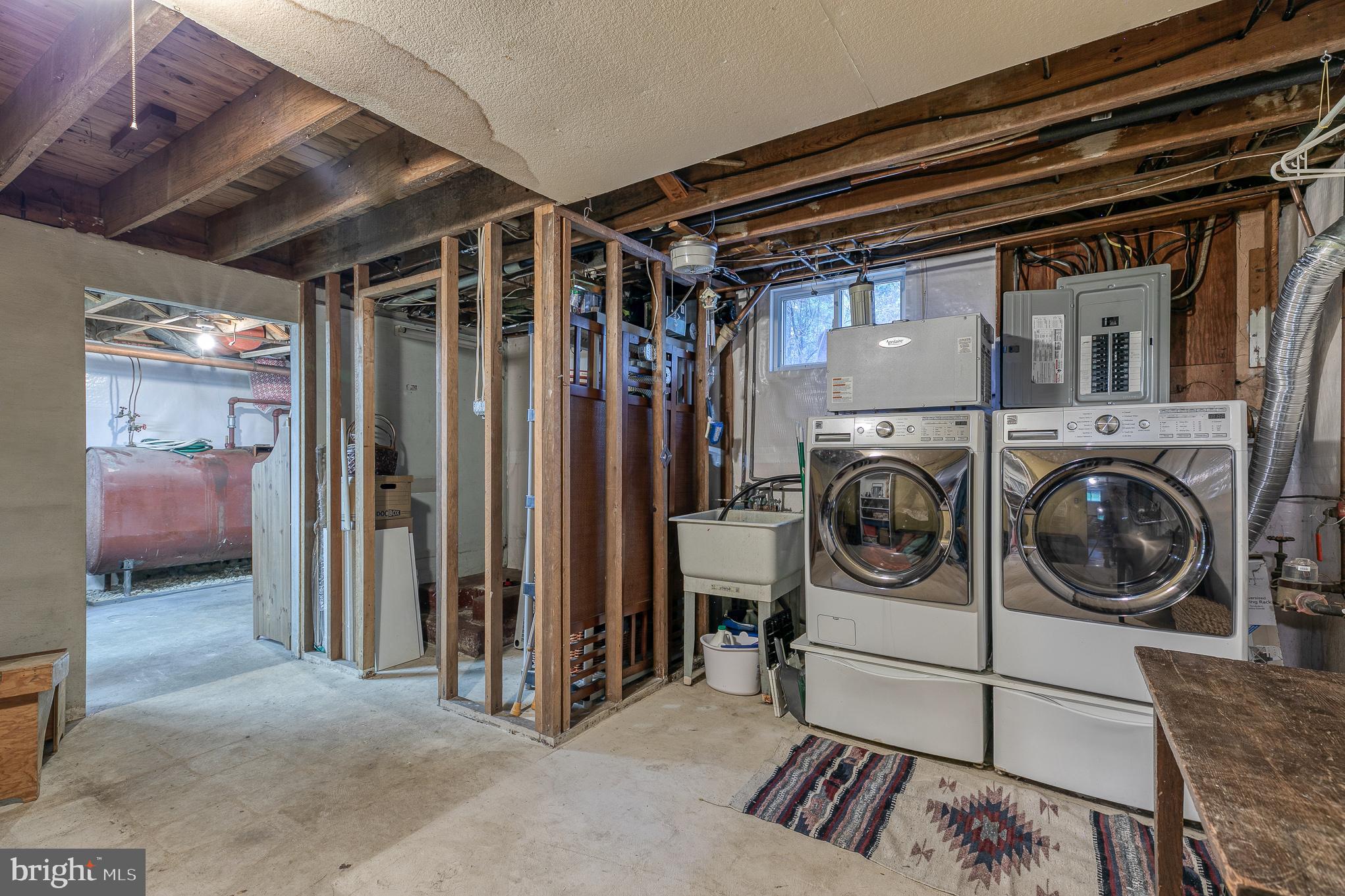 400 Farnum Road Media, PA 19063 - Photo 35 of 38 Lower Level Laundry and Plumed in Bathroom