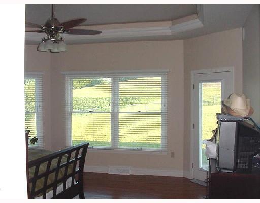 555 Chartiers Run Road Canonsburg, PA 15317 - Photo 8 of 8 Master Bedroom. First floor master suite has a wall of windows with a beautiful view...door to the outside patio. Gorgeous hardwood floors, tray ceiling and trim. Huge master bath and walk in closets! This is pure sanctuary!