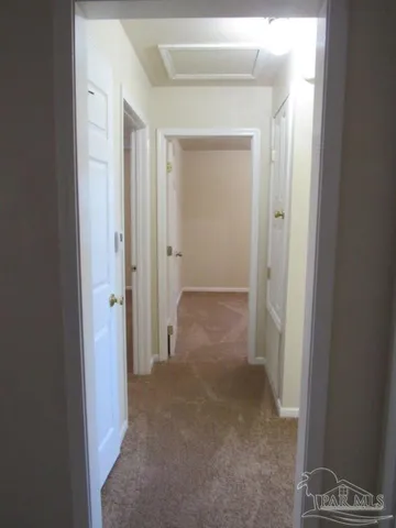 a kitchen with sink and cabinets