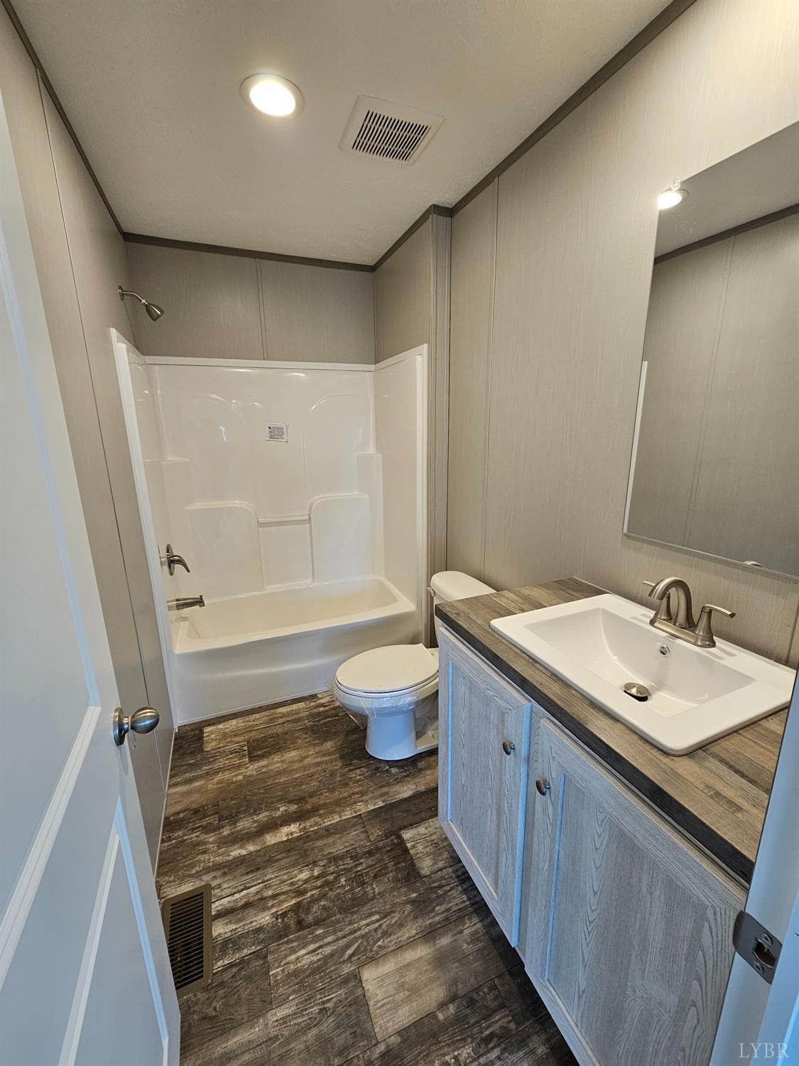 2066 Turkey Mountain Road Amherst, VA 24521 - Photo 5 of 19 a bathroom with a sink a toilet and shower