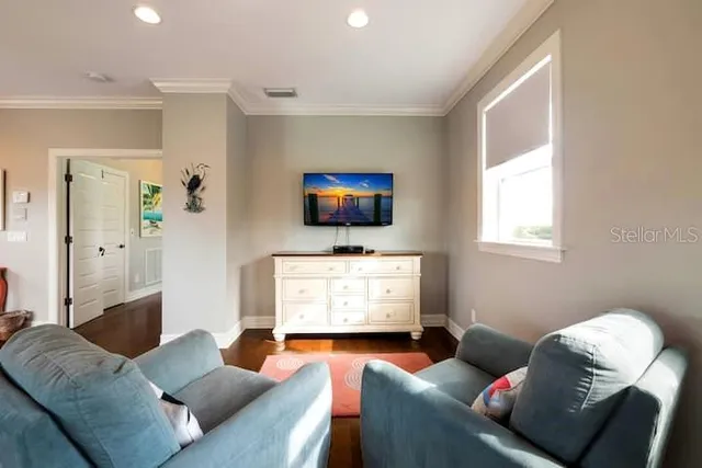 a bathroom with a toilet a sink and a mirror