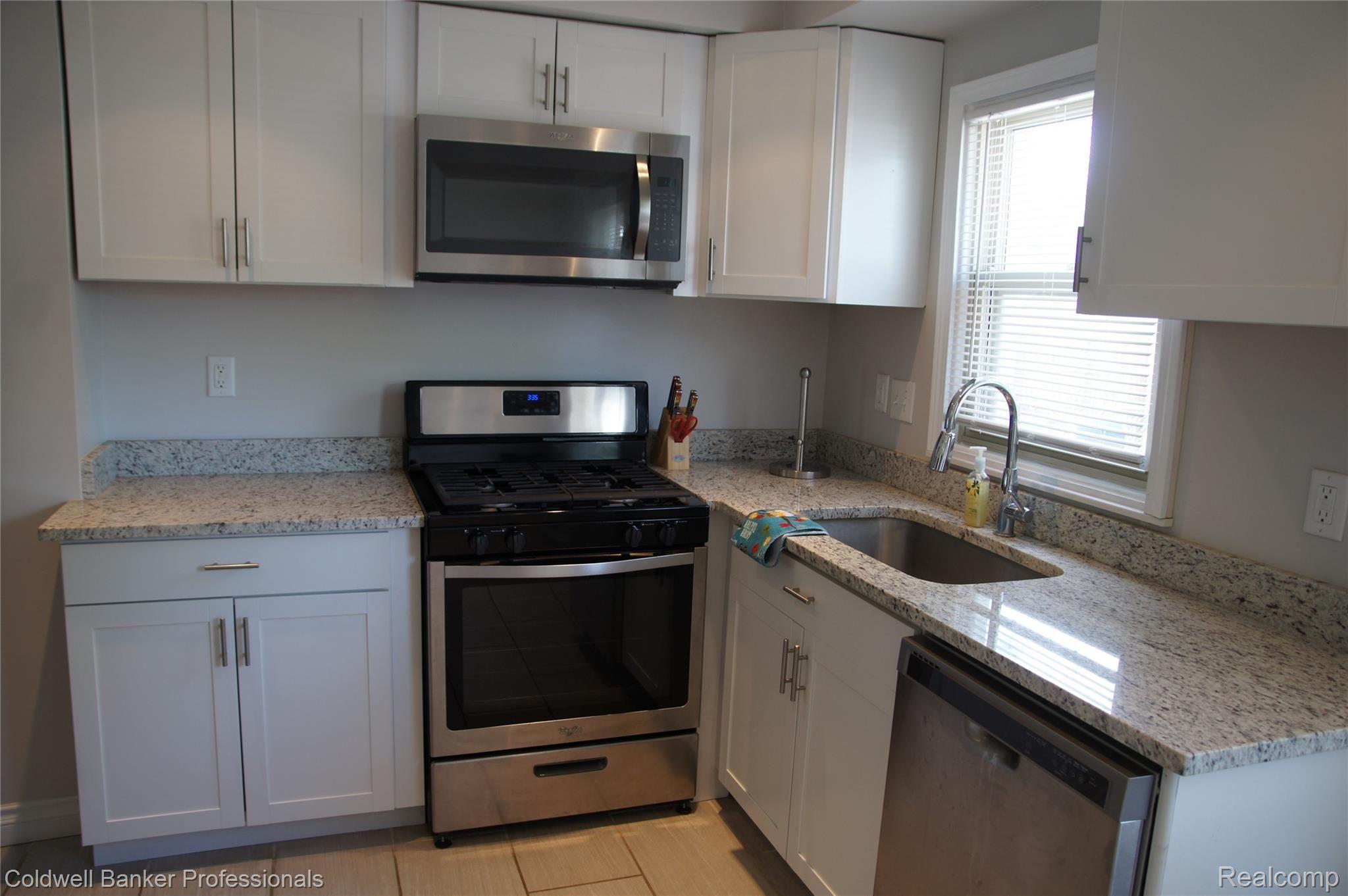 7965 Harding Street Taylor, MI 48180 - Photo 6 of 23 Kitchen with granite counters and recessed lighting