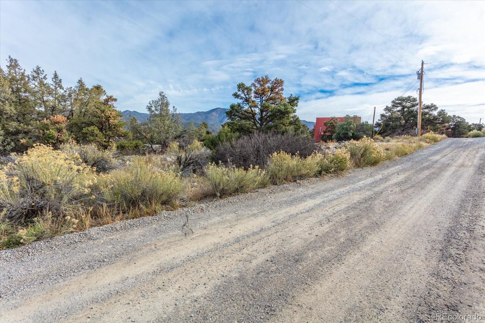 97 Loop Drive Howard, CO 81233 - Photo 11 of 33 a picture of a road with a building in the background