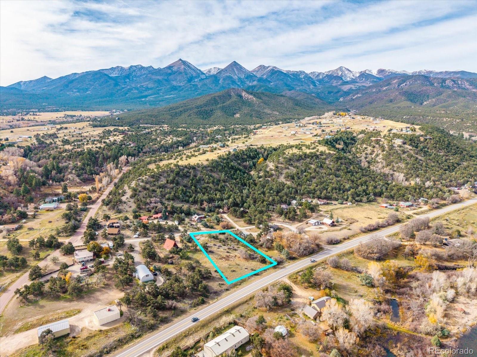 97 Loop Drive Howard, CO 81233 - Photo 2 of 33 a view of a city with mountains in the background