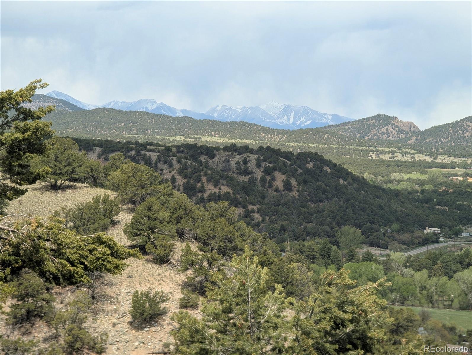 97 Loop Drive Howard, CO 81233 - Photo 25 of 33 a view of a mountain in the distance in a field