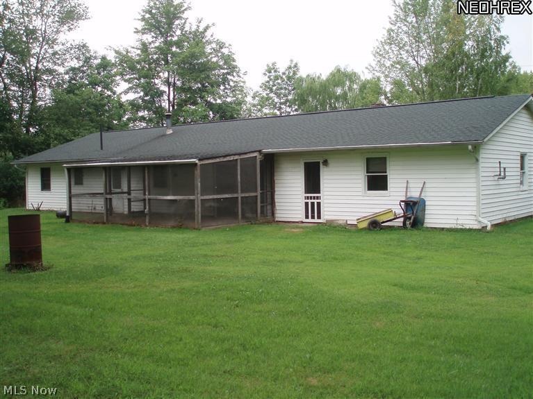 6619 Taylor Road Painesville, OH 44077 - Photo 3 of 7 A little work to the back porch and you will have a nice sitting area from which to view the rear yard.