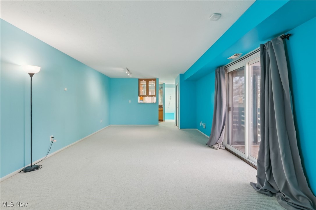 3484 Mayfield Road, Unit 3426 Cleveland Heights, OH 44118 - Photo 29 of 33 Spare room featuring baseboards and carpet floors