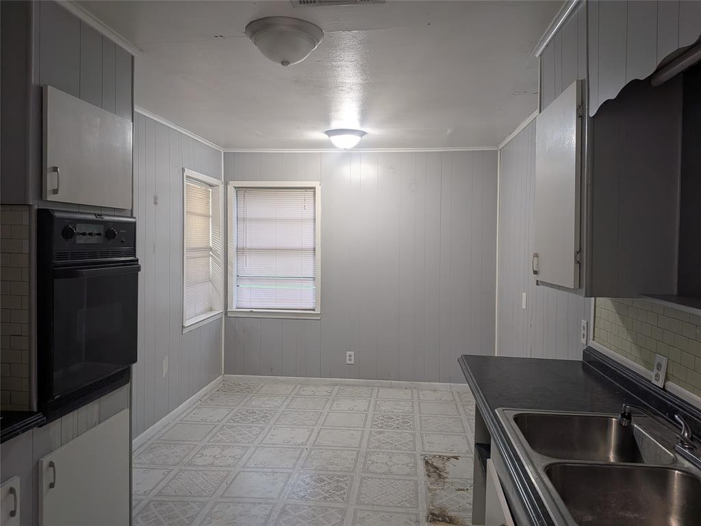 2009 County Road 4619 Athens, TX 75752 - Photo 11 of 36 a kitchen with a refrigerator and a sink
