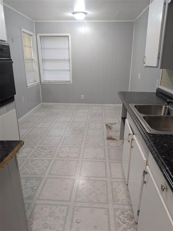 2009 County Road 4619 Athens, TX 75752 - Photo 17 of 36 a kitchen with a sink and a stove top oven